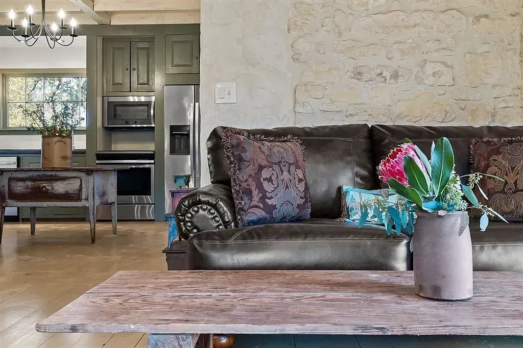 A living room with a couch and a coffee table