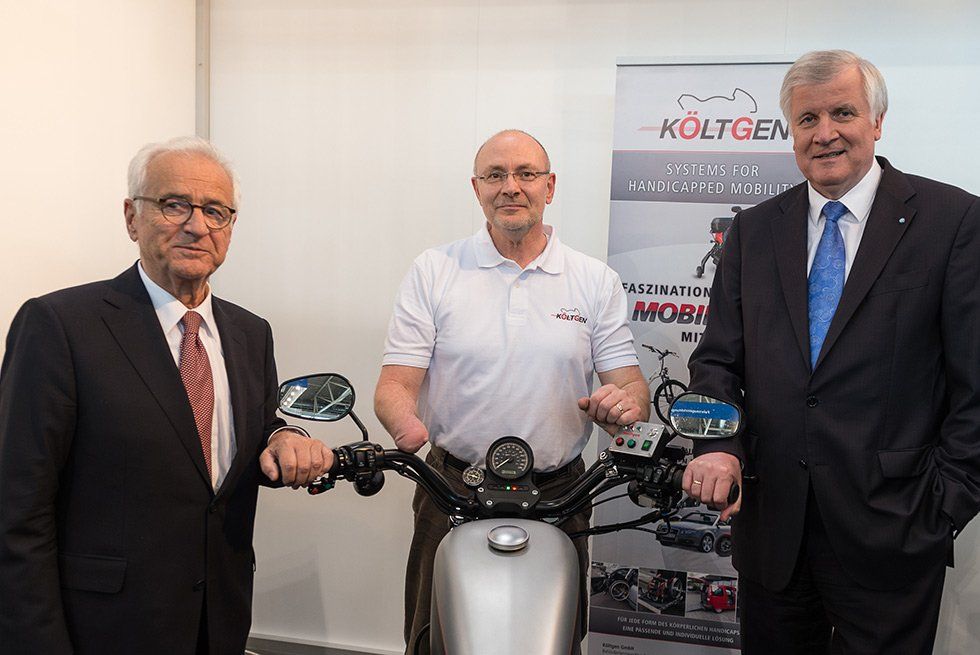 Költgen GmbH mit einem Motorrad