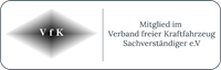 White logo with “VfK” and German text “Mitglied im Verband freier Kraftfahrzeug Sachverständiger e.V.”