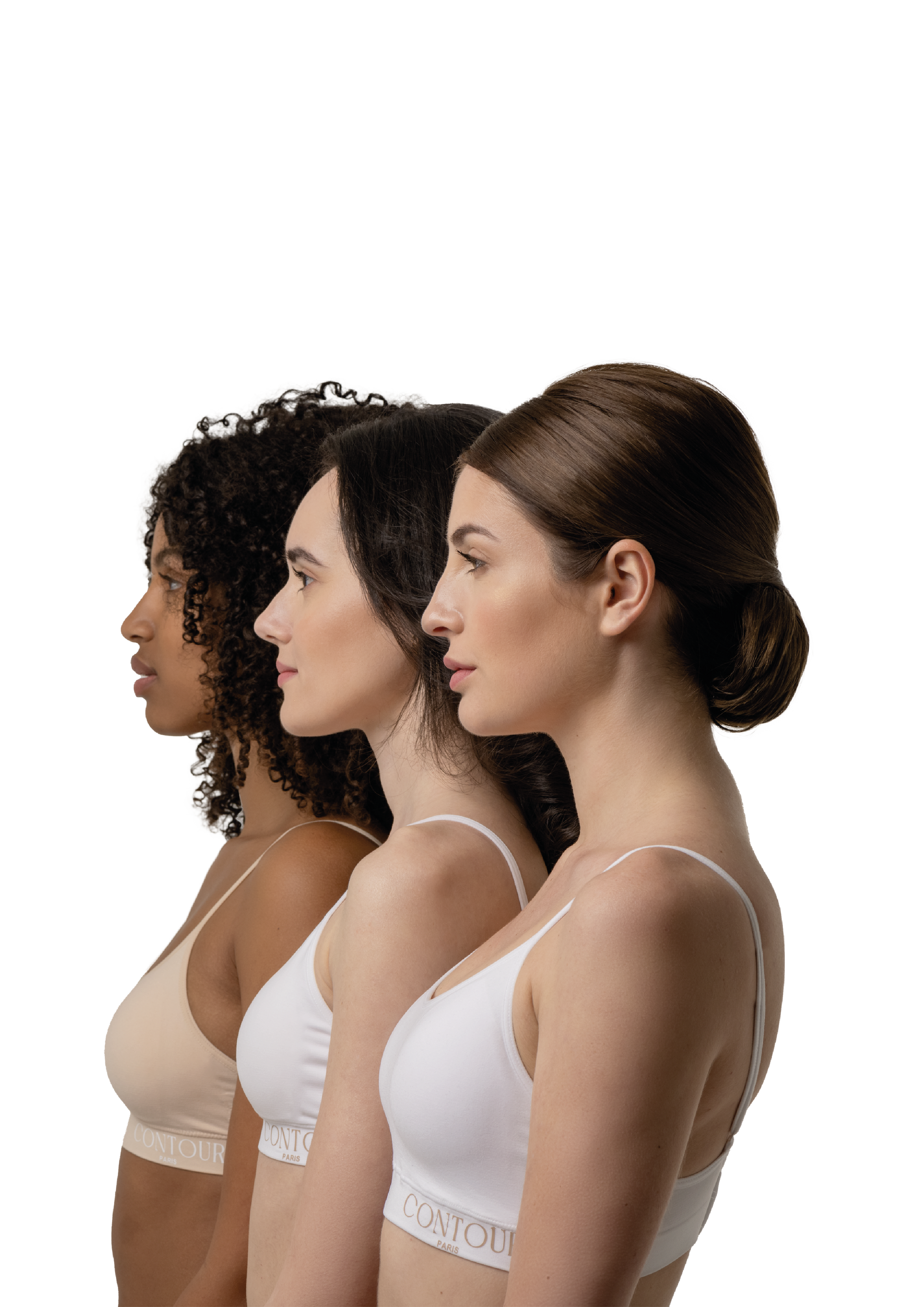 Trois femmes de profil, portant des soutiens-gorge blancs et beiges.