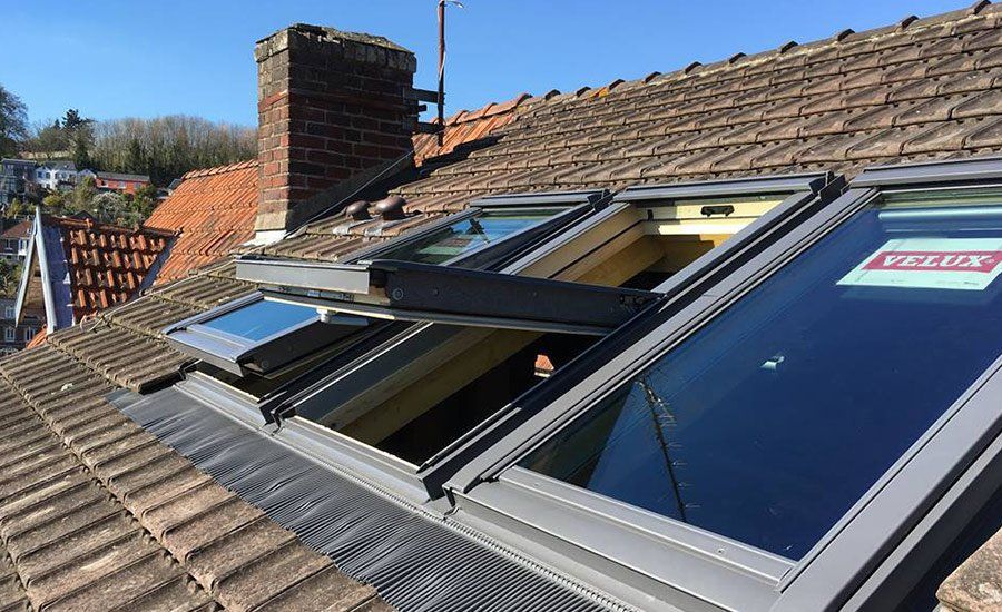 Des Velux sur le toit d'une maison