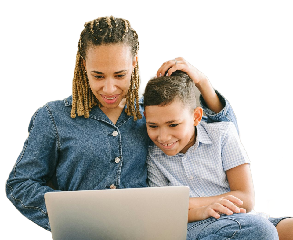 Woman and boy smiling, looking at laptop; woman's hand on boy's head.