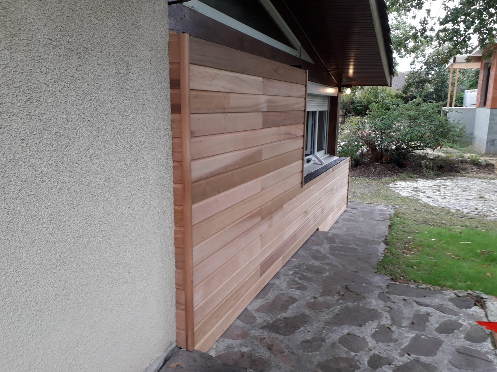 Façades avec enduit et bois