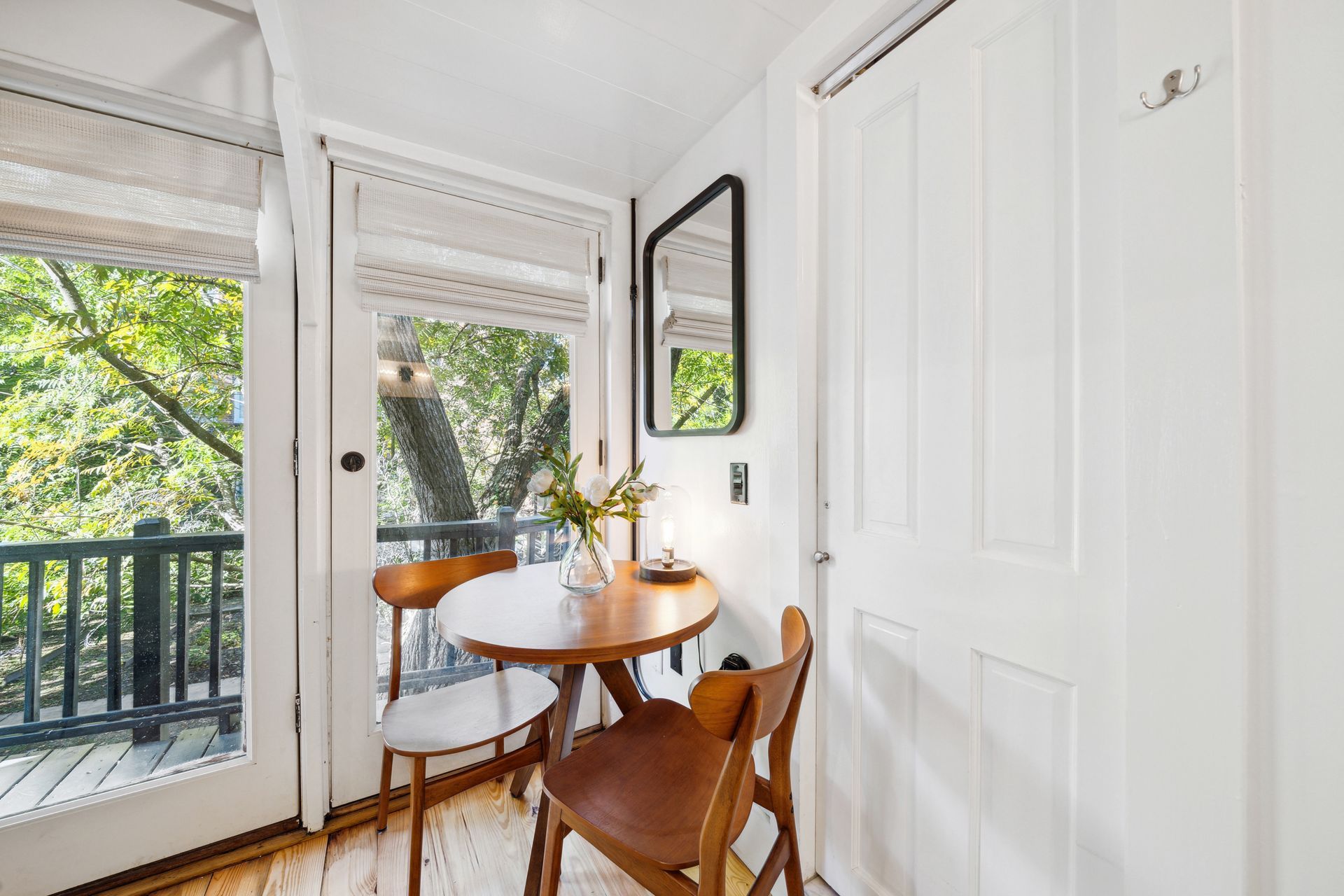 two person dining set in the corner of a room