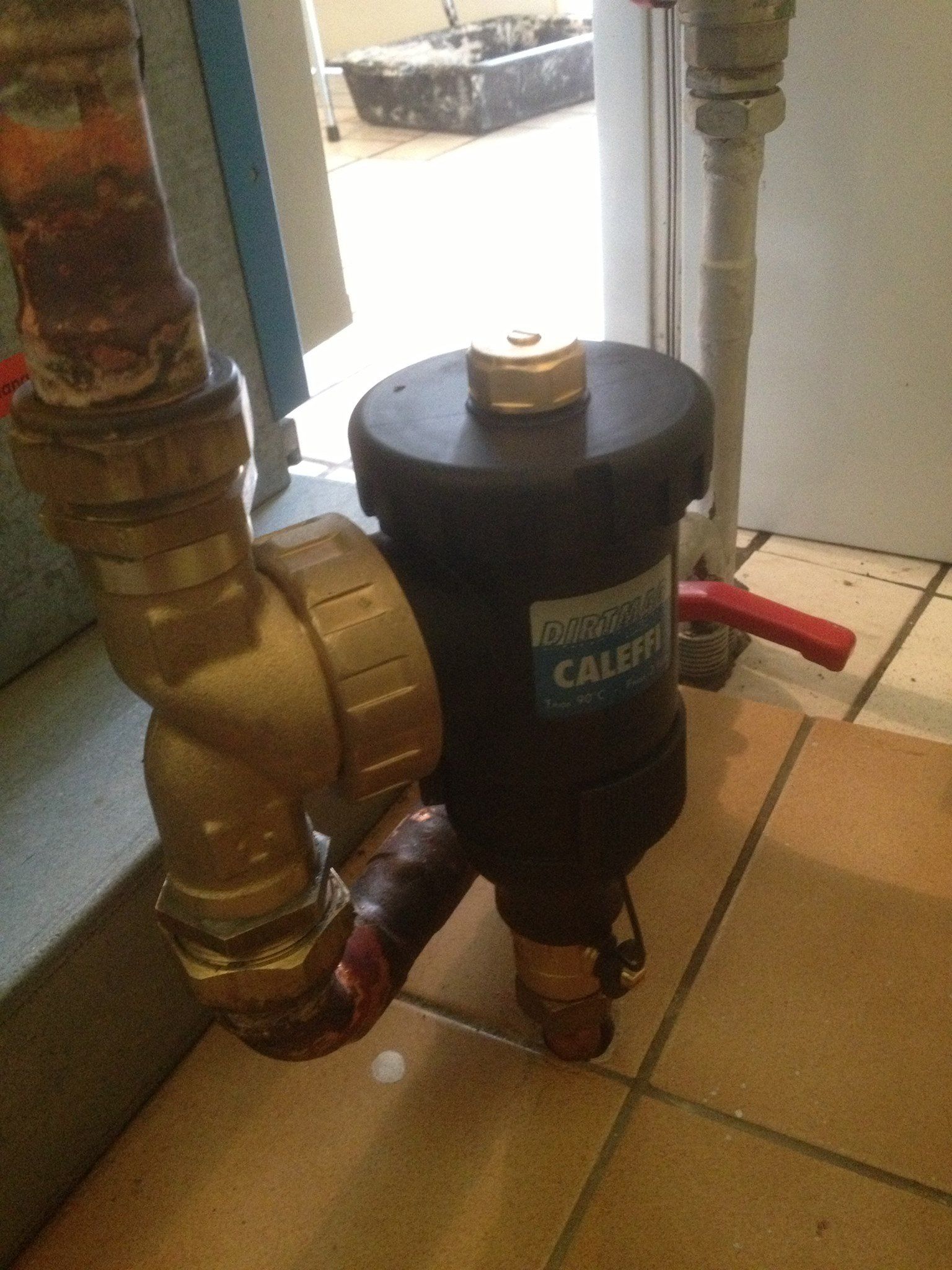 Installation d'un pot à boues