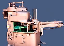 Una máquina con una caja verde en el medio.