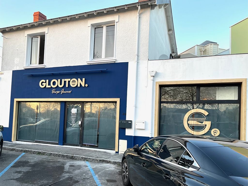Enseigne Glouton