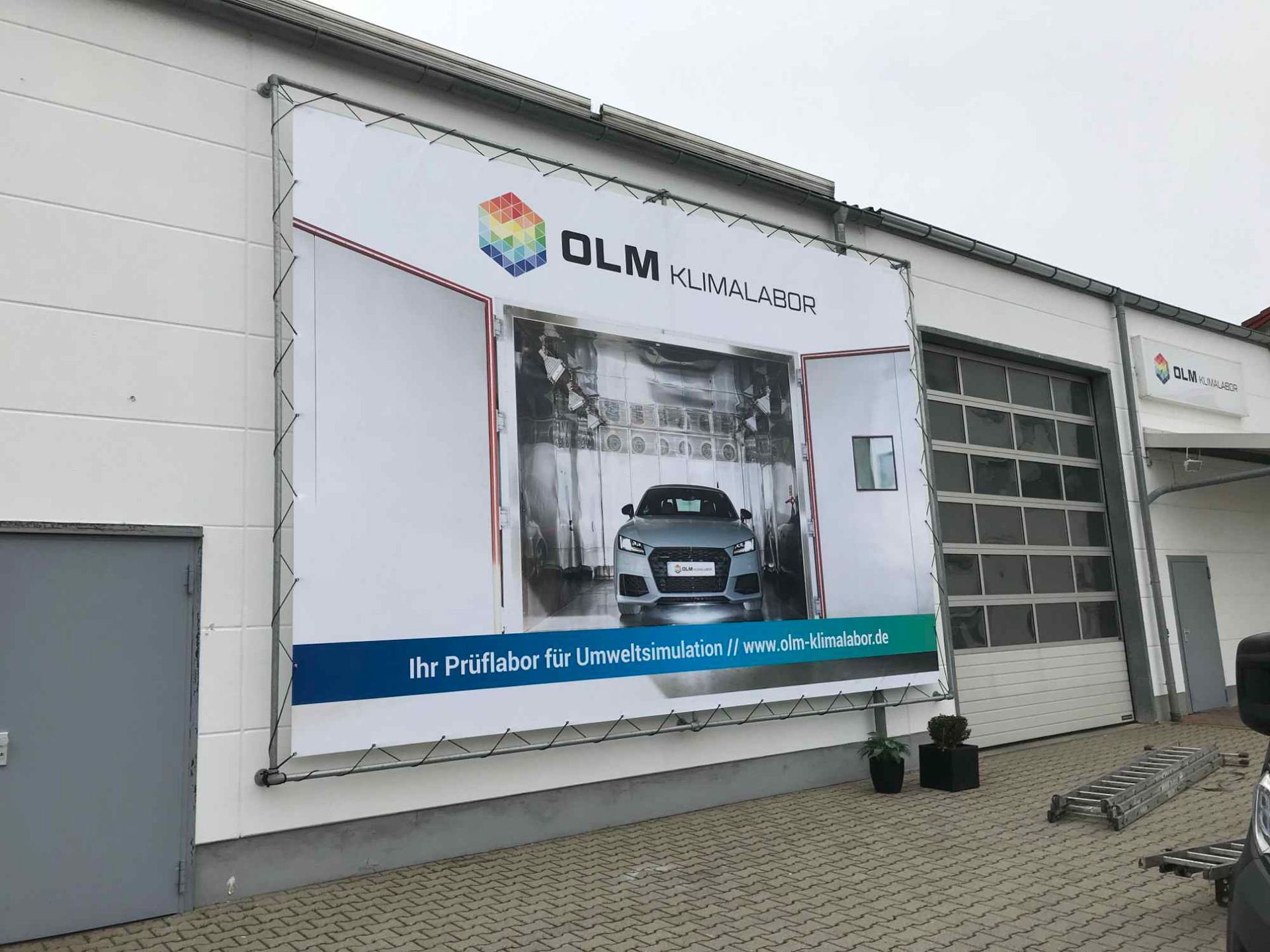 Banner für die Firma OLM Klimalabor