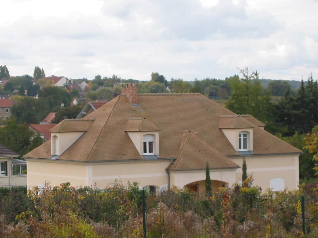 Réalisation de couverture en tuiles plates