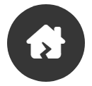 Un icono de casa blanca en un círculo negro sobre un fondo blanco.