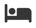 Una silueta de una persona acostada en una cama.