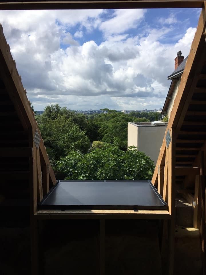 Pose d'une fenêtre de toit - pendant