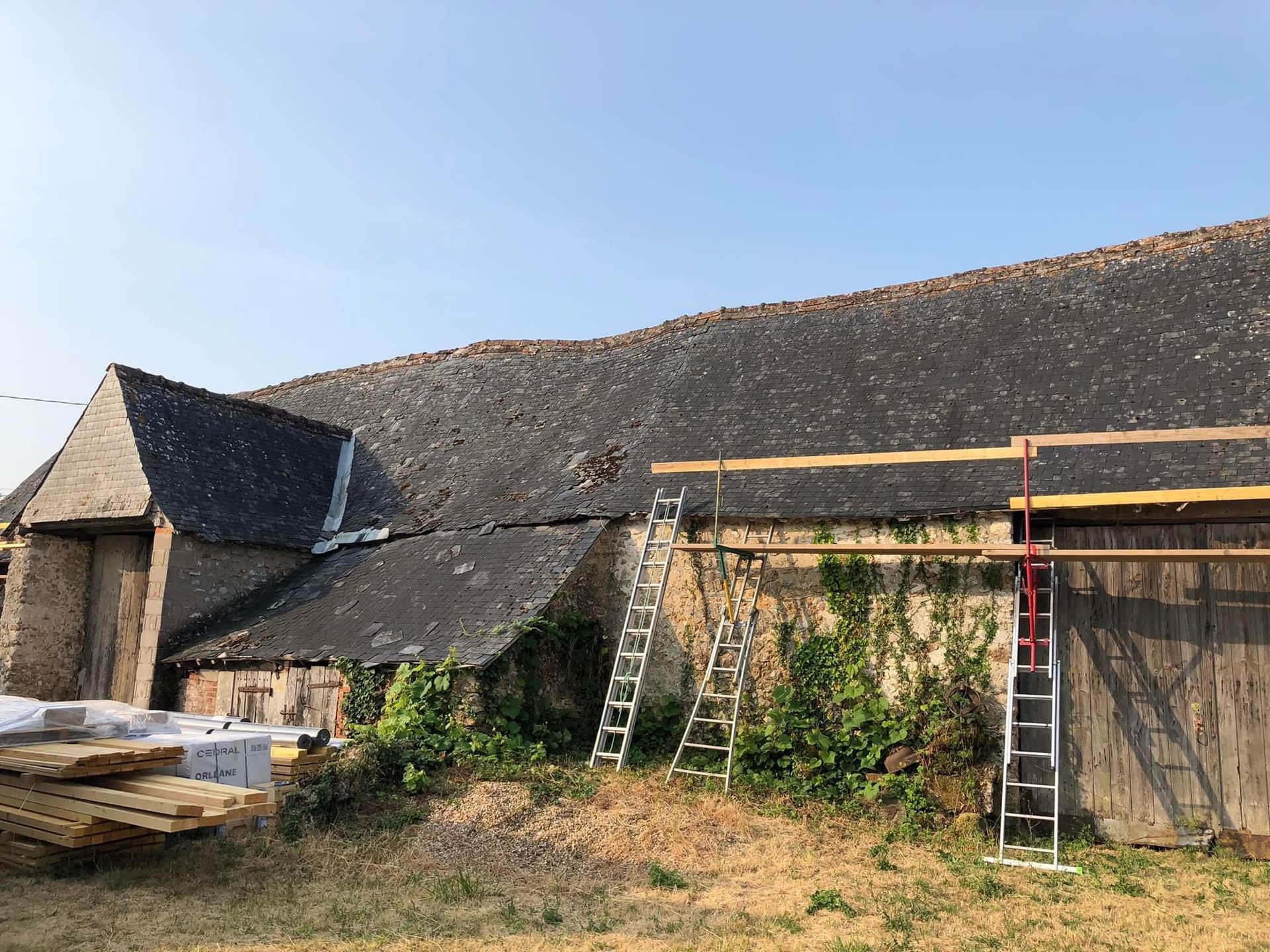 Rénovation complète d'un toit en ardoise