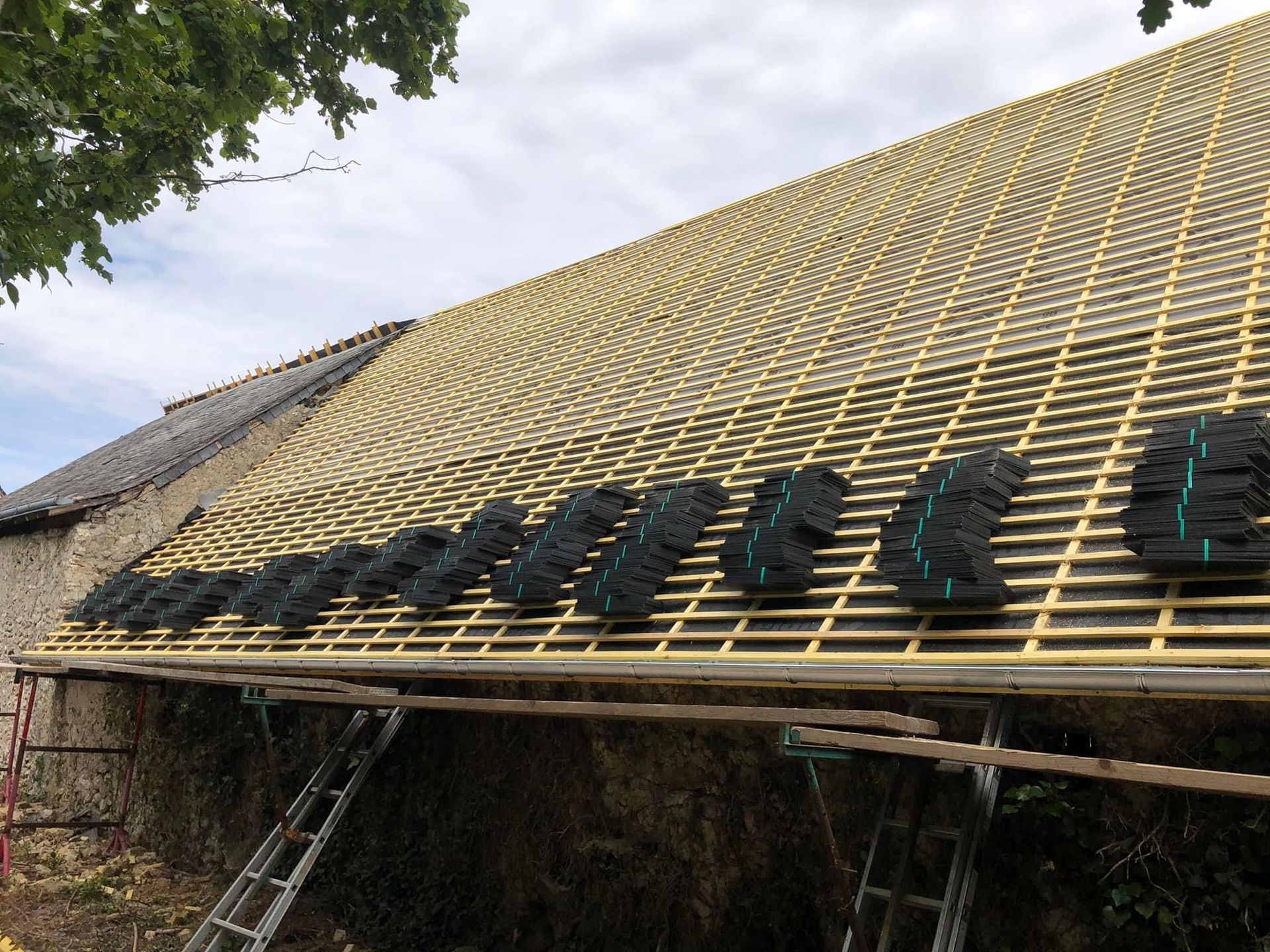 Rénovation d'une toiture - pendant