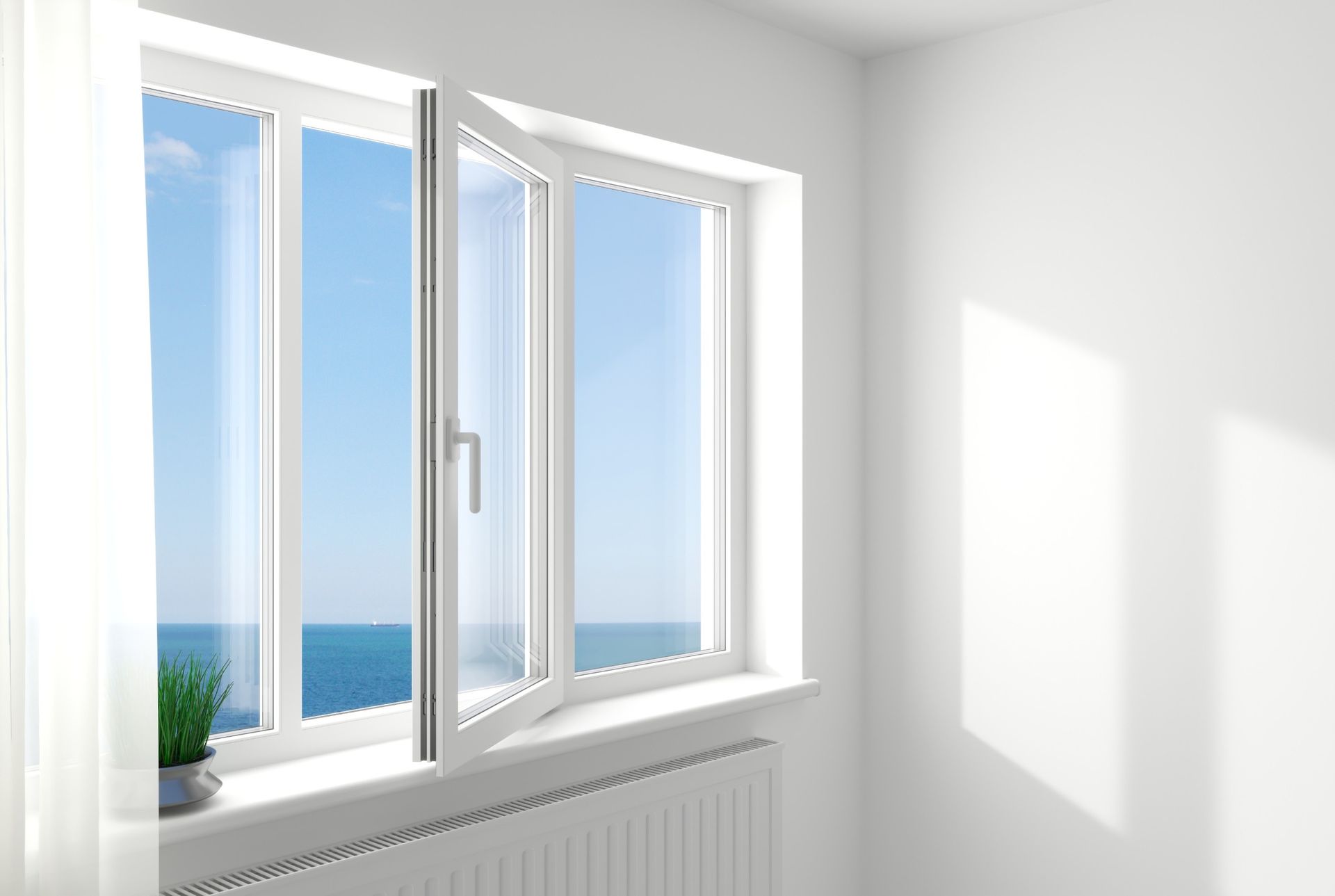 Hay una ventana con vista al mar en la habitación.