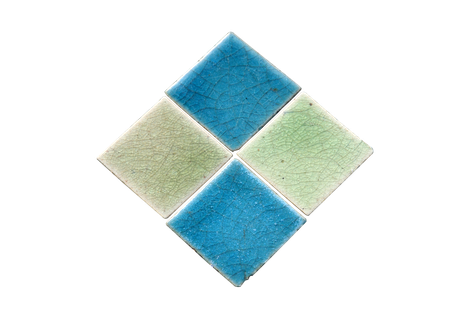Un carré de carrelage bleu et vert.