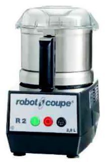 Un procesador de alimentos robot coupe r2 está sentado sobre una mesa.