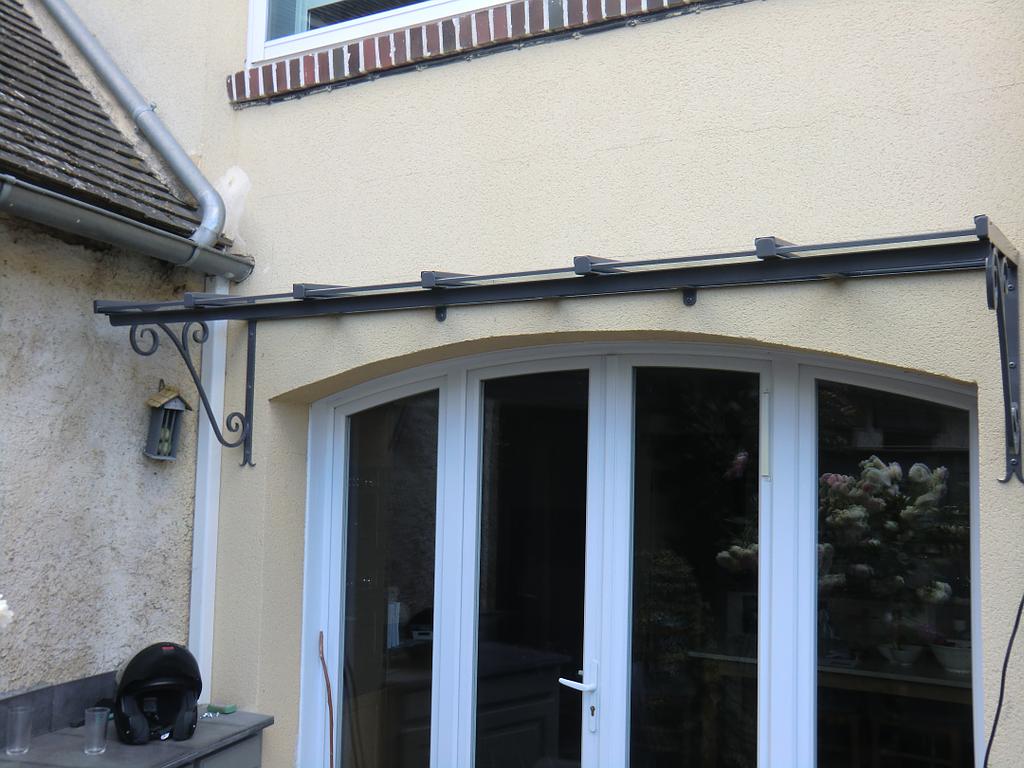 Marquise pour baie vitrée