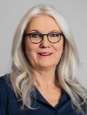 Die Silhouette einer Frau ohne Gesicht auf grauem Hintergrund.