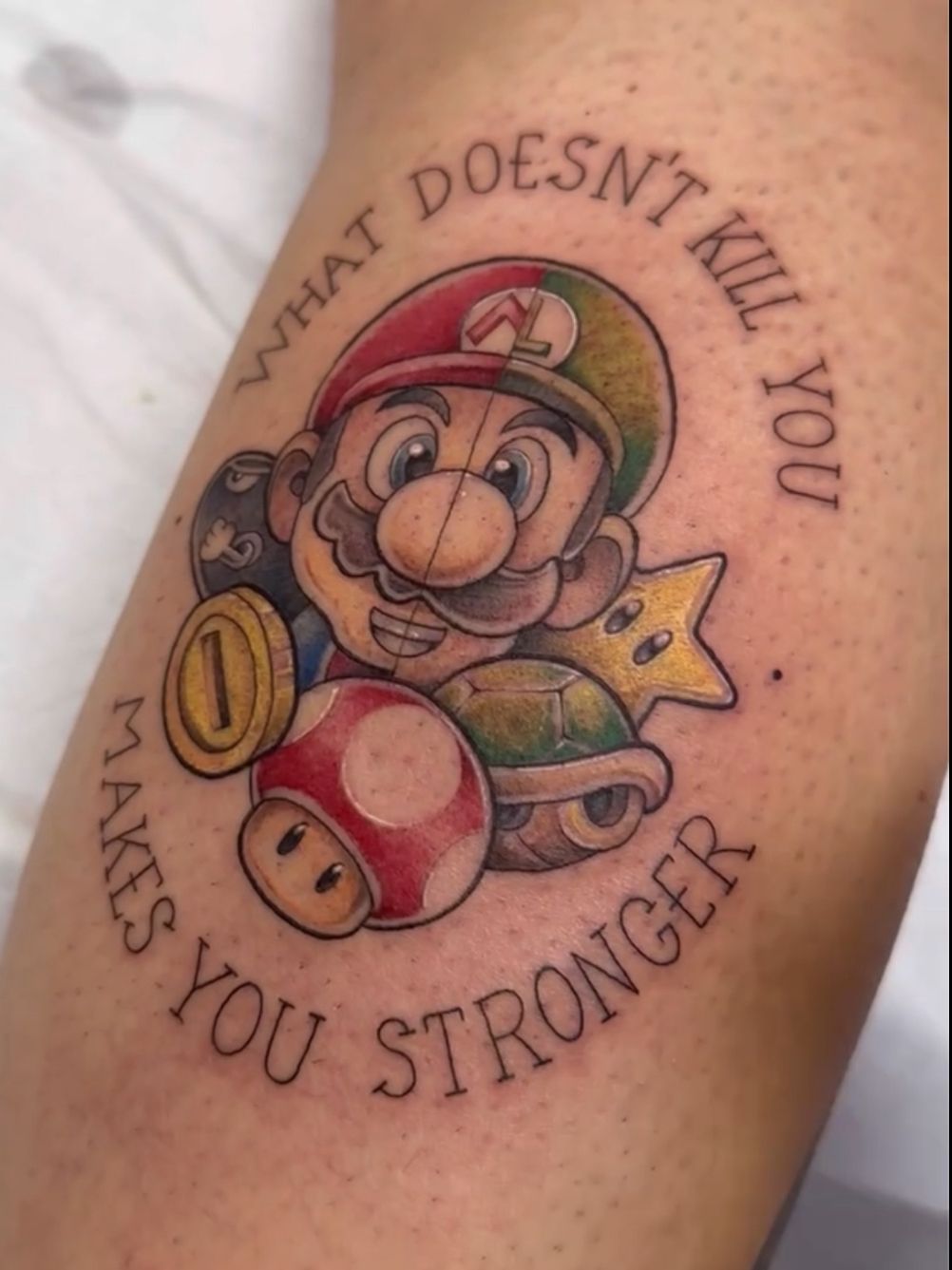 Tatuaje de Mario con la frase 