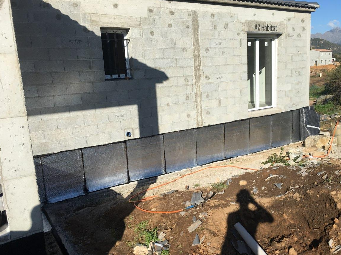 Travaux d'étanchéité sur des murs entérrés