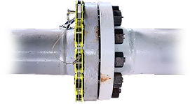 Pipe flange with bolted connection; sensors attached around the flange.