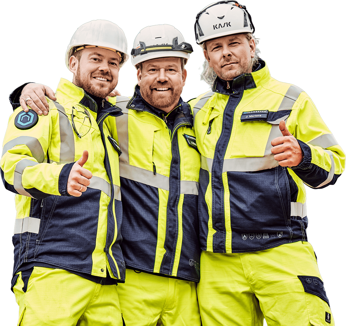 Three construction workers in reflective jackets and hard hats.