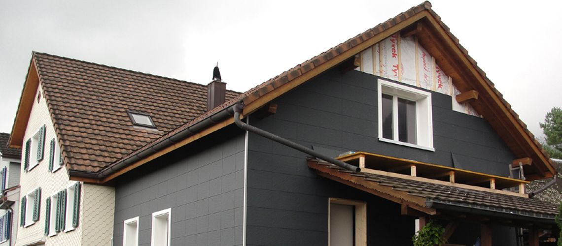 Verkleidung eines Wohnhauses – Arbeiten der Frank Sperling Dachdecker GmbH