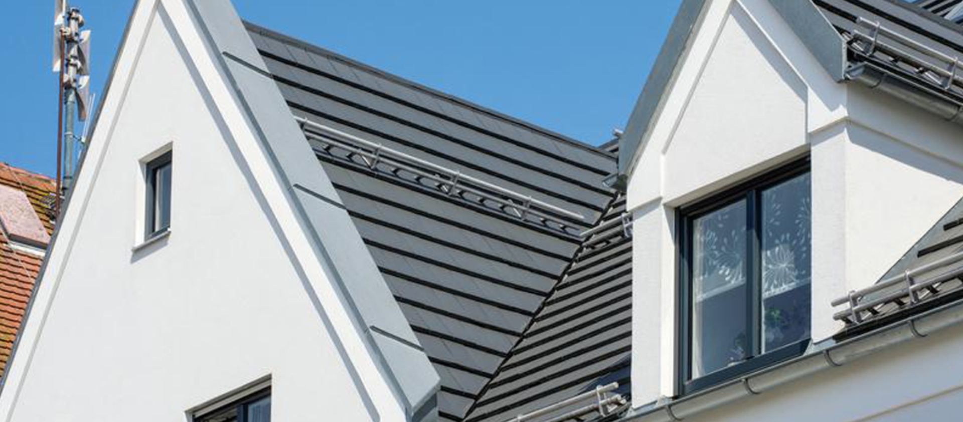 Haus mit Steildach – Arbeiten der Frank Sperling Dachdecker GmbH