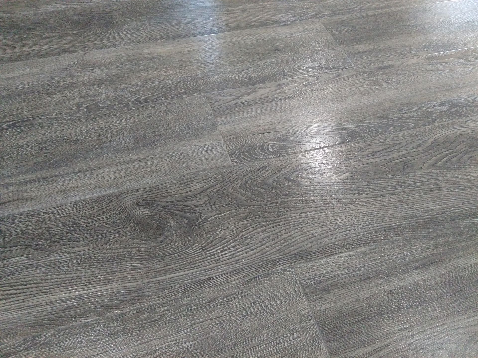 Sol en lame PVC collé