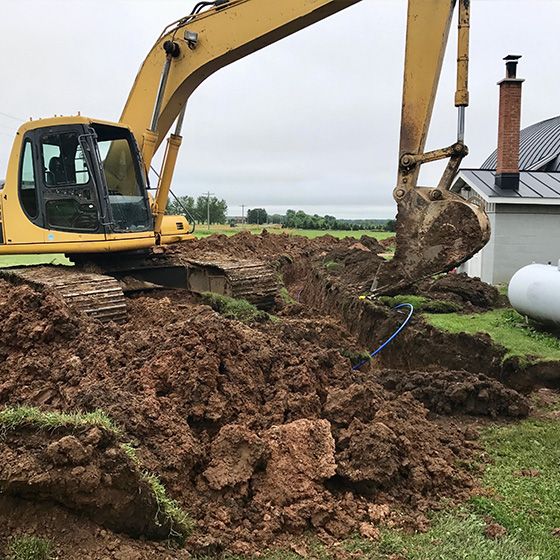 Tractopelle en action