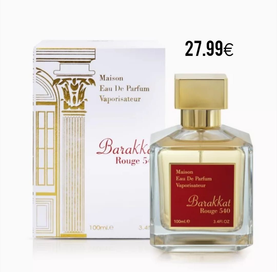 Una botella de Barakkat Rouge está junto a su caja.