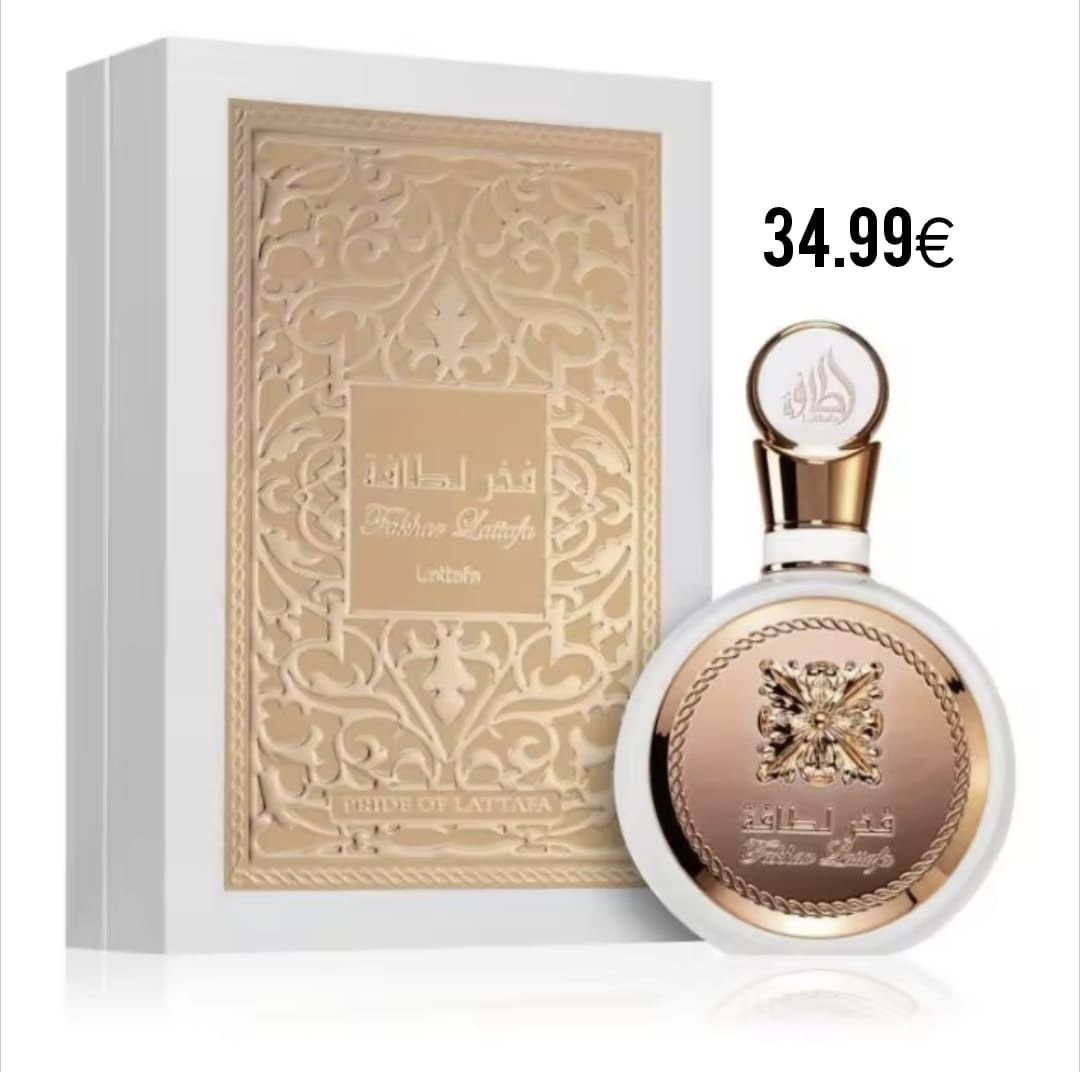 Una botella de perfume al lado de una caja que dice 34,99