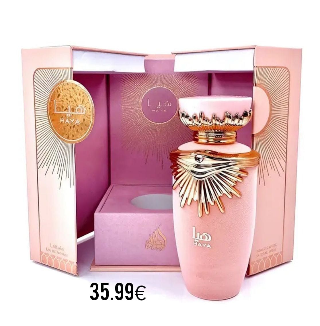 Un frasco de perfume se encuentra frente a una caja rosa.