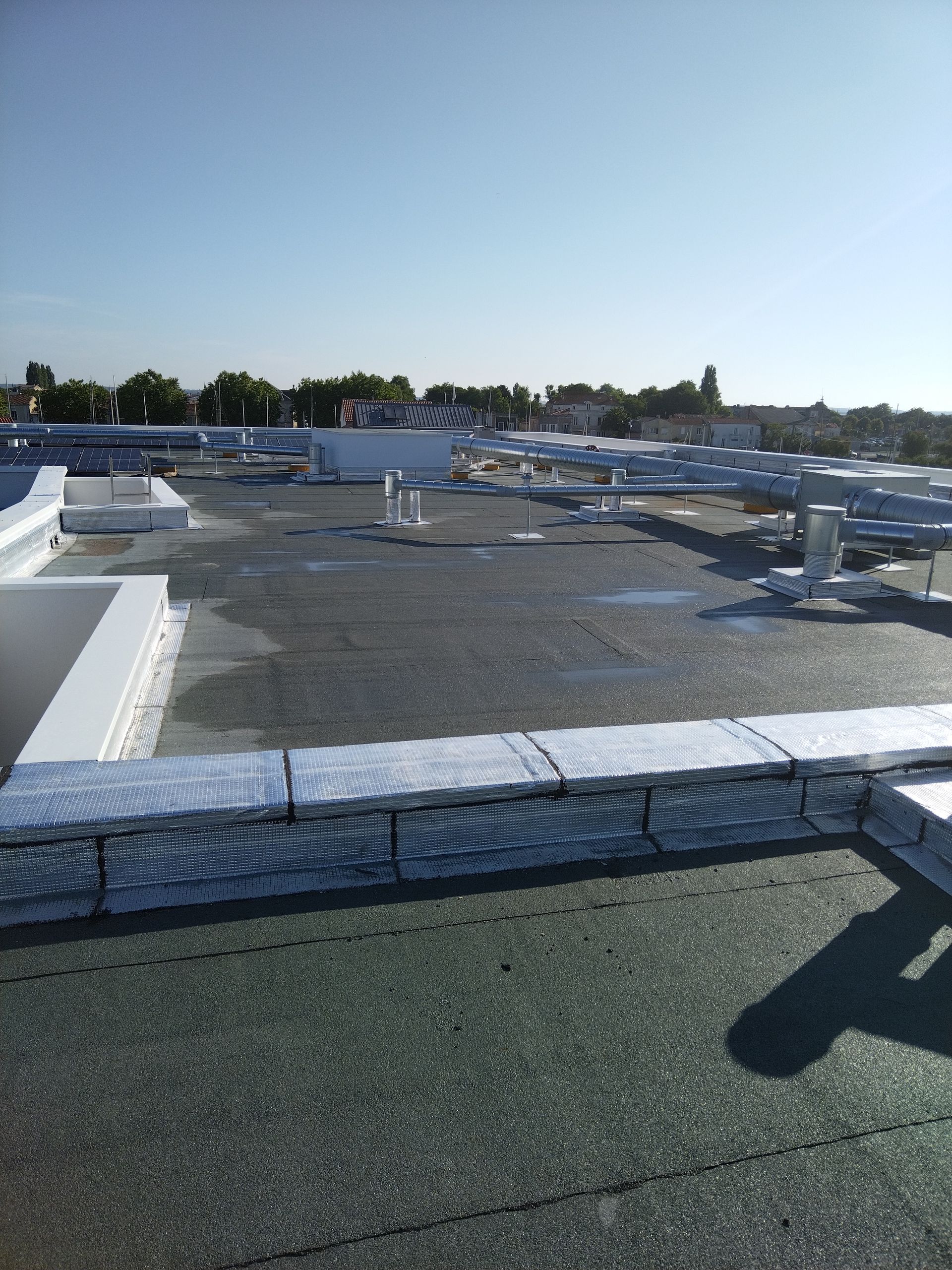 Étanchéité toit commerce