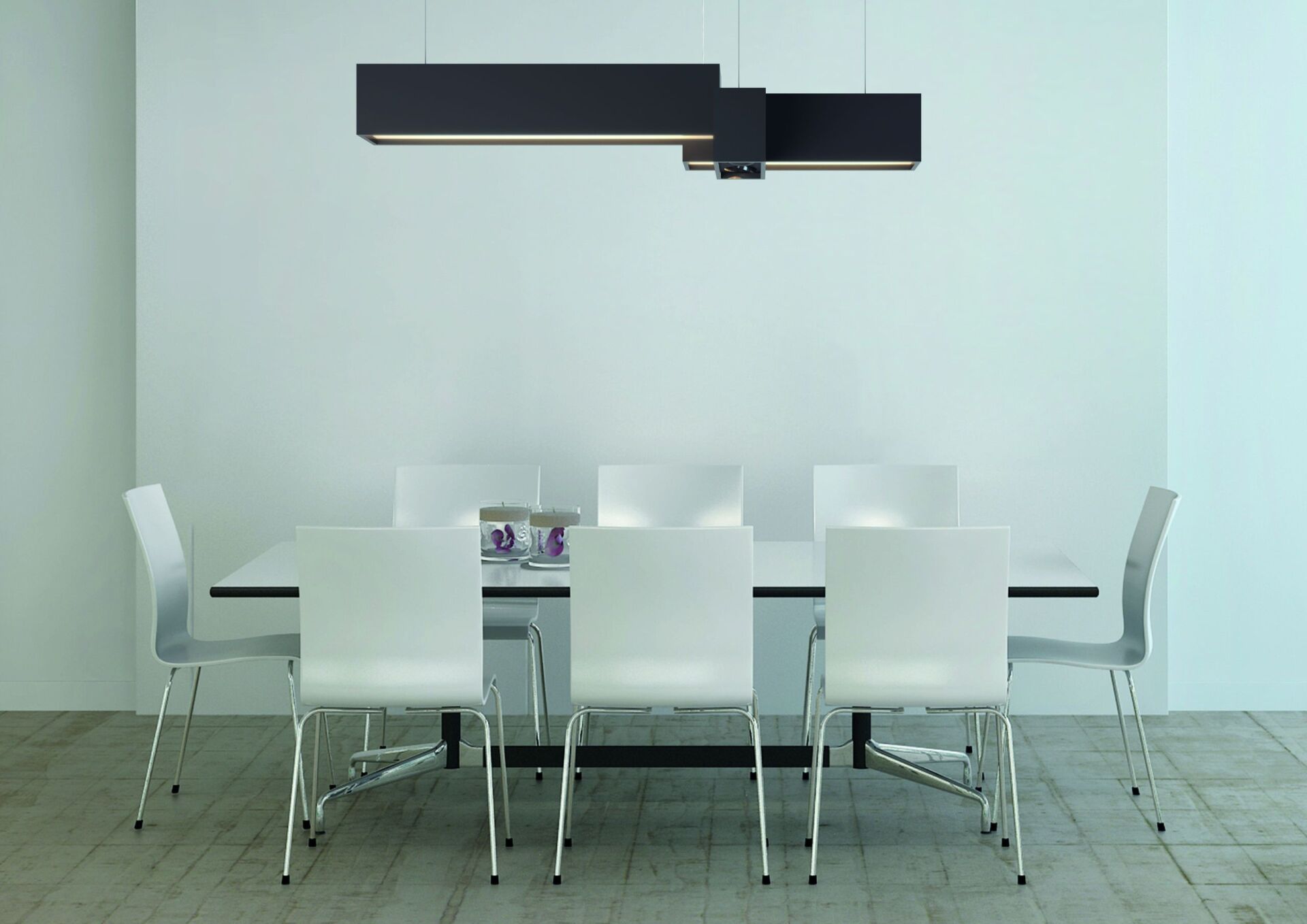 Ein Esszimmer mit einem langen Tisch und weißen Stühlen