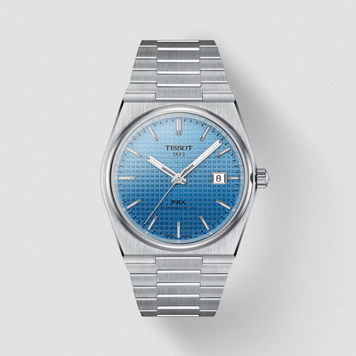 Tissot PRX-Uhr mit blauem Farbverlaufszifferblatt und silbernem Edelstahlarmband.