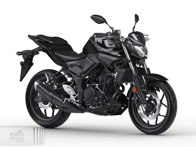 Una motocicleta negra está sentada sobre una superficie blanca.