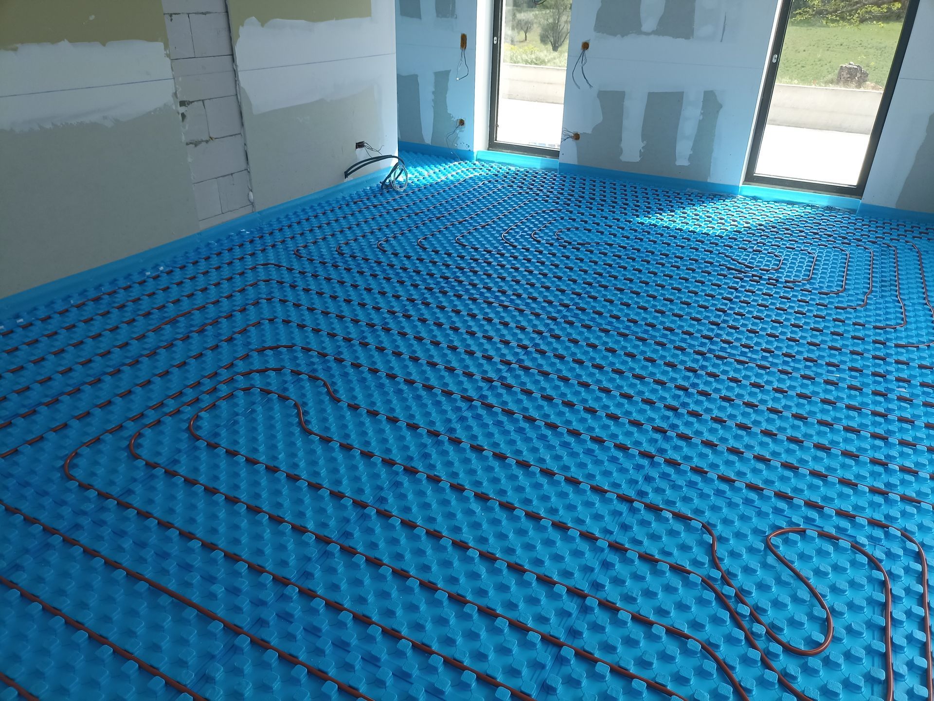 Chauffage au sol bleu