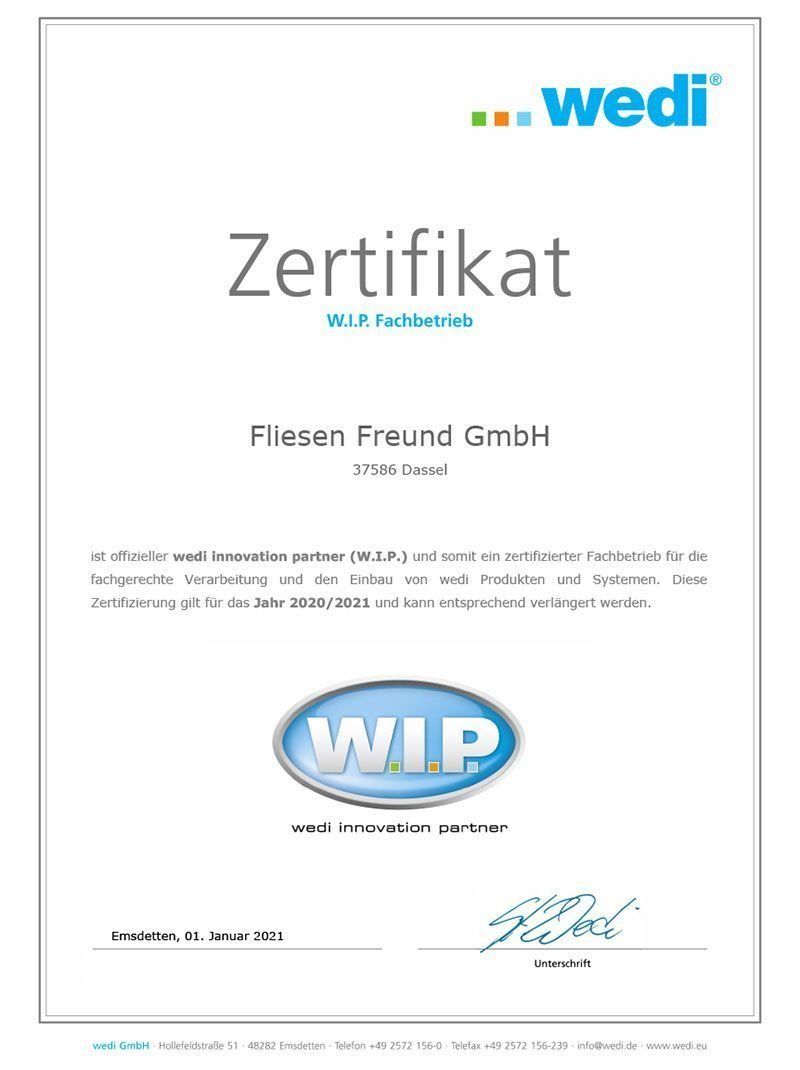 Zertifikat von WEDI für Fliesen Freund GmbH. Enthält Logo, Text und Unterschrift.