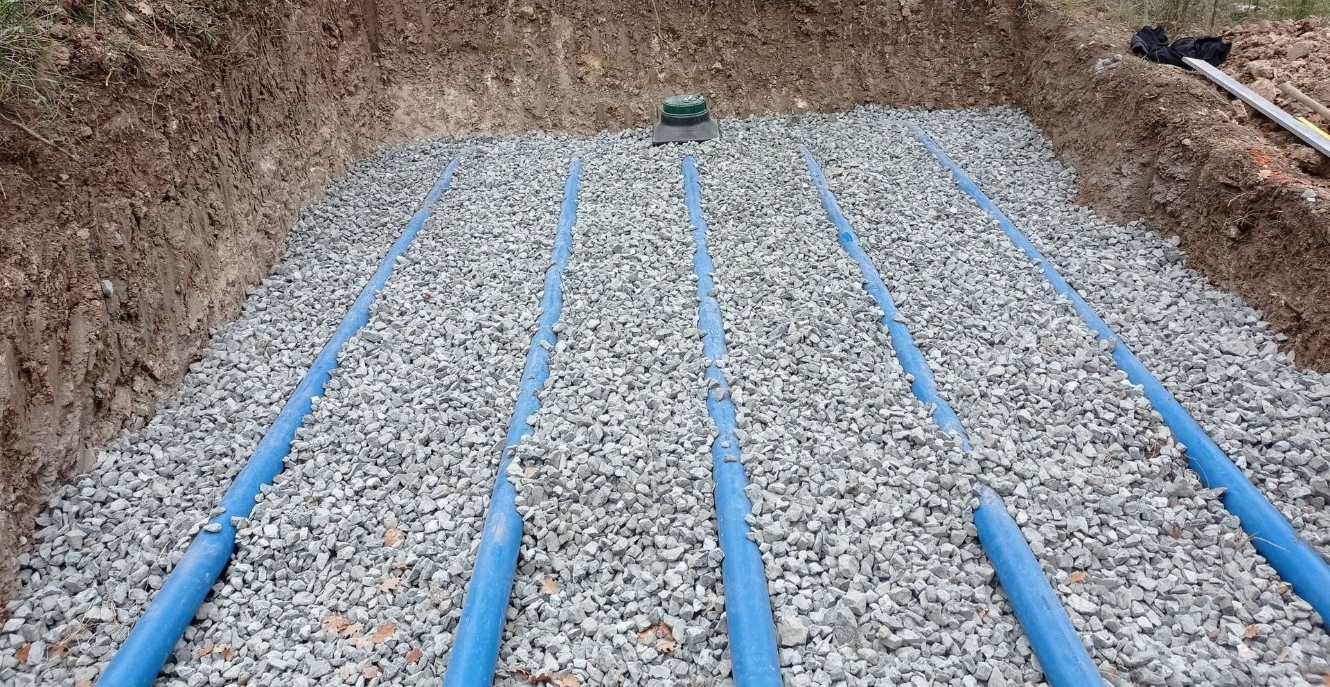 Système d'assainissement recouvert de graviers