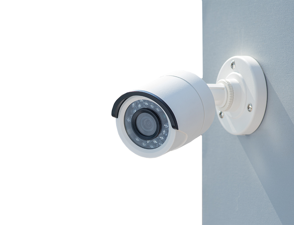 Petite caméra de surveillance accrochée au mur