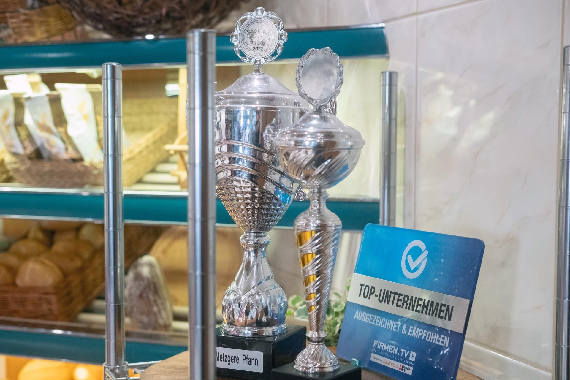 Urkunde der Metzgerei Pfann als Anerkennung für Qualität und handwerkliche Tradition.