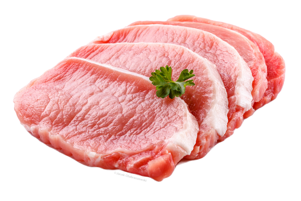 Frisches Schweinefleisch in Scheiben, roh und hochwertig aus Metzgerhand Frisches Schweinefleisch in Scheiben, roh und hochwertig aus Metzgerhand