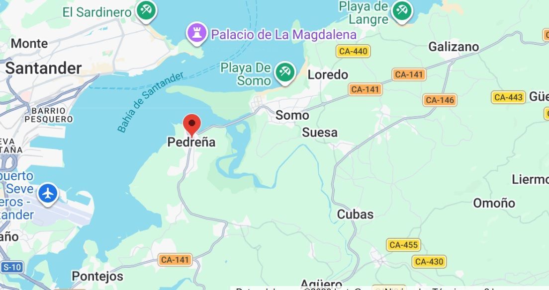 Bicicleta de carga amarilla con compartimento de almacenamiento negro.