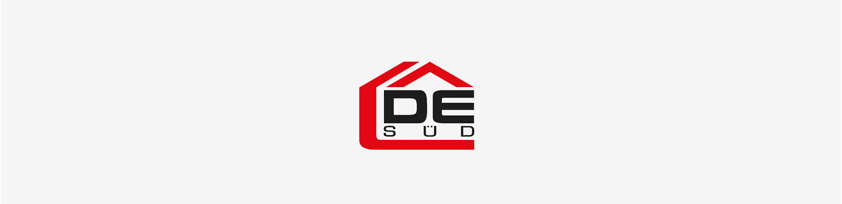 Ein rot-schwarzes Logo eines Hauses mit dem Wort „de“ darauf.