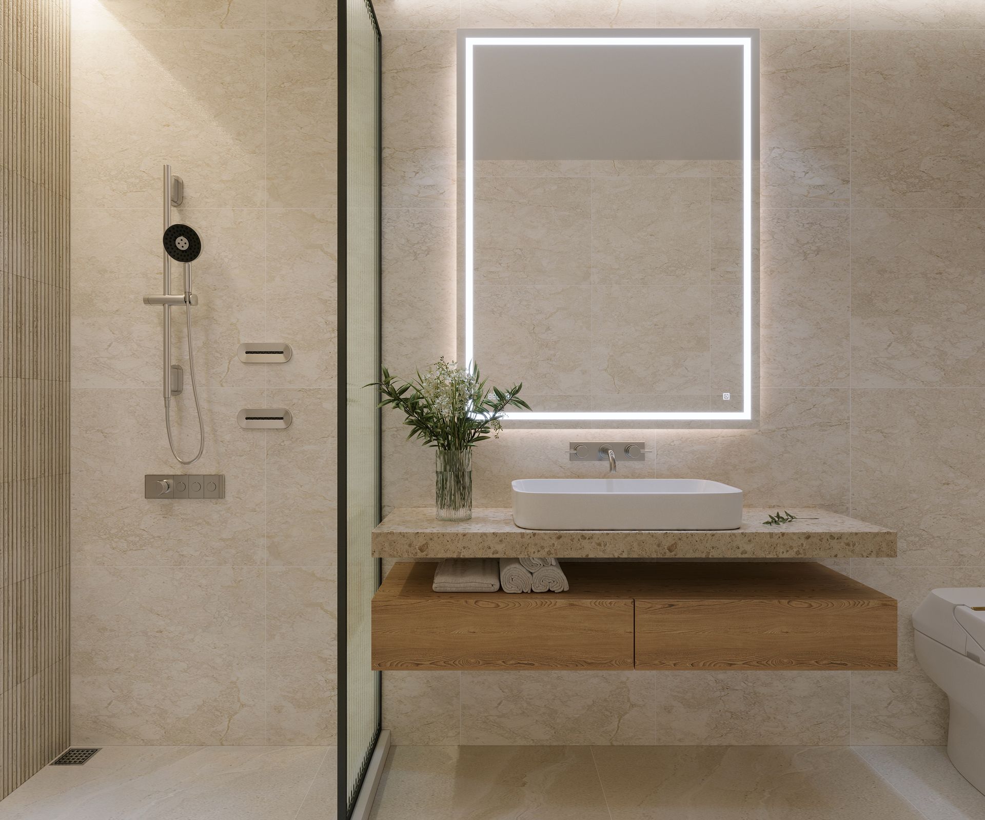 Salle de bains moderne avec miroir éclairé au-dessus d'un meuble sous lavabo suspendu et douche.