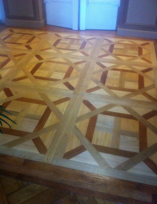 Pièce avec un parquet d'Aremberg