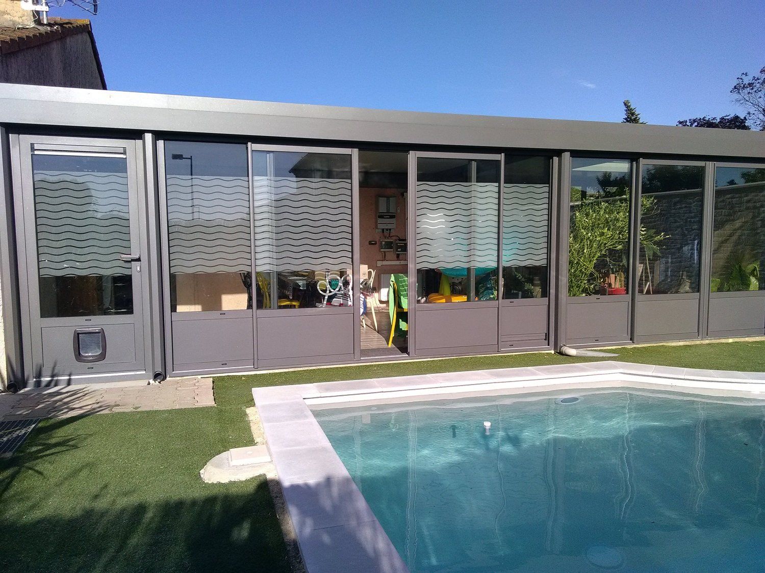 Véranda aluminium à toiture plate