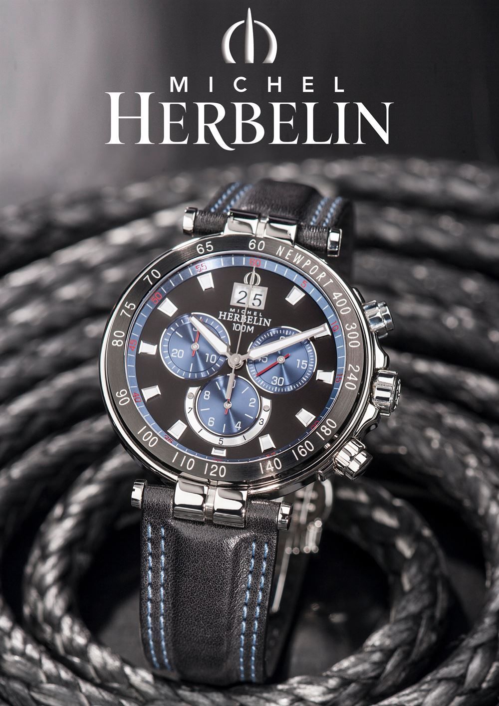 Eine Michel Herbelin Uhr hängt an einem Seil